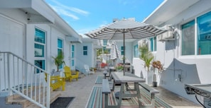 Shared outdoor with courtyard and BBQ area.