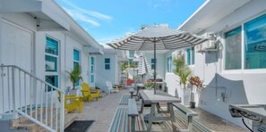 Shared outdoor with courtyard and BBQ area.