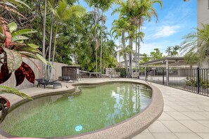 The building offers a shared pool where guests can refresh with a dip before drying off on the sun loungers. 
