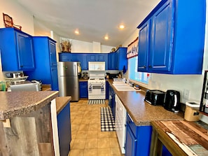 Blue Kitchen at Almost Bearadise cabin dishes/utensils/toaster/blender/crockpot