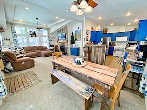 Almost Bearadise cabin open living/dining/kitchen areas coffee bar comfy couch