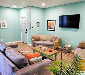 Stay and Play Living Room and GIANT Smart TV