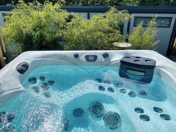 This spa comfortably seats five individuals and features three hydro massage seats for added comfort.