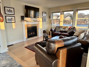 Living room relax and enjoy complete with fireplace.