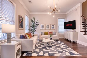 {Living Room} 
55" Smart TV w Roku, Games, and Cards
