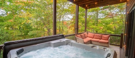 Cozy, private hot tub with lighting and seating area