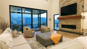 Great Room overlooking Pineview Reservoir, or view the extra large smart tv, including your own Netflix