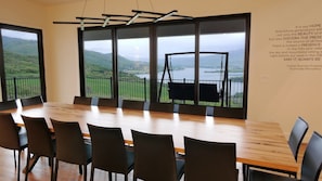 Custom log Dining table, unobstructed magnificent views of Pineview Reservoir and Eden/Powder Mountain