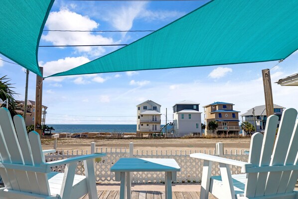 Gorgeous Ocean Views from the hightop Adirondack chairs!