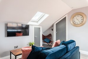 Living Room/Dedicated workspace/TV