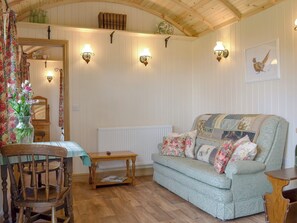 Charming living/ dining room area | Shepherds Lodge - Morrells Wood Farm, Leighton, near Shrewsbury