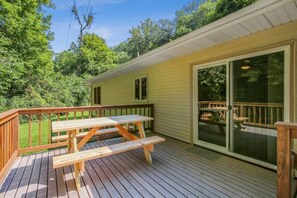 Off the dining room / kitchen area, enjoy your coffee enjoying the nature around