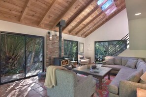 Living room with Queen size inflatable bed stored in Chest.