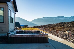 Relax in the private hot tub and enjoy the view!