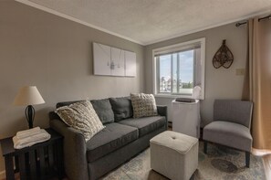 Unwind on the sofa which has sleeping capacity for two people.