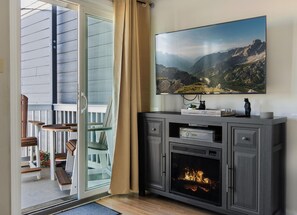 The living room, with the electric fireplace, is a great place to gather with your group!