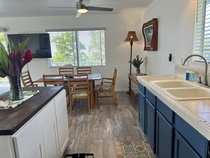 Kitchen, island and dining area