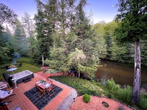 Bonfire!  Hot tub!  Patio with dining table!  River by the tranquil Boardman River!  What else could you ask for??