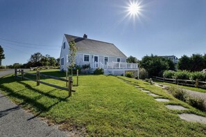 Ocean views from multiple spaces in and out,  pretty yard, and outdoor shower!