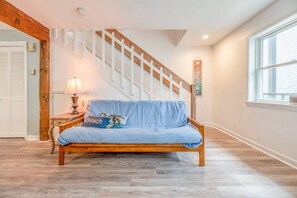 Living room area with 2 futons for extra sleeping space