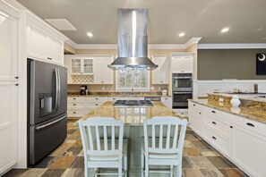 Kitchen with gorgeous island and extra seating.