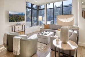 Our spacious living room boasts a Smart TV and features a comfortable pull-out sofa for your convenience.