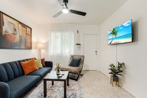 Unwind on our cozy futon in the inviting living room