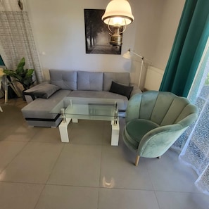 Comfortable, fold-out sofa in the living room.