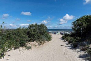 The building is situated close to the beach.