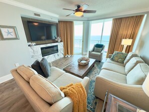 Living Room with TV & Fireplace