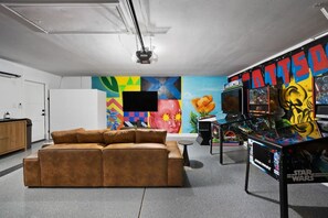 A world of luxury and relaxation in our state-of-the-art entertainment room. Indulge in your favorite movies or host game nights with friends and family