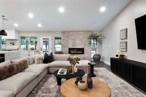 Dive into the comfort of our beautifully furnished living room and let the stress melt away.