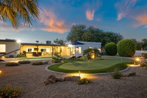 Who needs to drive to the golf course when you can have one right in our front yard? Swing away and enjoy a game of golf anytime you want!