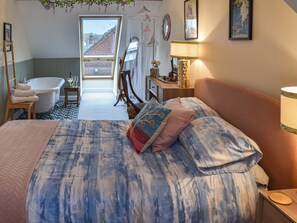 King size bed with free standing bath  | Harbour View Villa, Gorleston-on-Sea, near Great Yarmouth