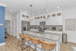 All new amenities in this redesigned kitchen with a breakfast island.  Unique style to this gem!