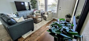 The living room is cozy and well appointed.