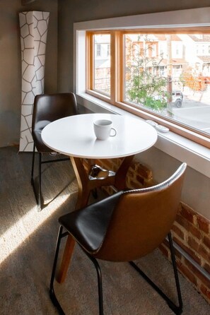 The seating in the loft area is beyond relaxing  ! the building  on the far right is Lancaster Brewing Company.