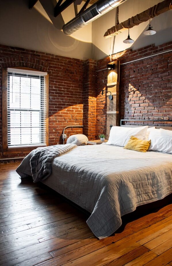 Bedroom with king bed and tv that comes down from the ceiling!