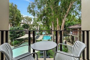 Wake up to energising resort views as you open the doors to the balcony, where you can enjoy your morning coffee. 