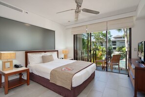 The studio suite is set with a comfortable king bed with a cooling breeze from the ceiling fan and central air-conditioning.
