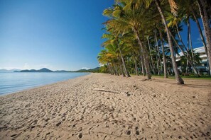 Just a two-minute stroll away, enjoy the golden sands and calm waters of iconic Palm Cove Beach, lined with swaying palms.