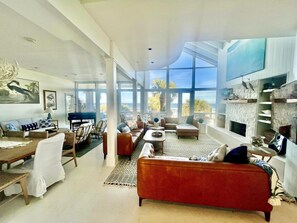 Gathering room with large smart tv , chess and a plethora of seating choices .