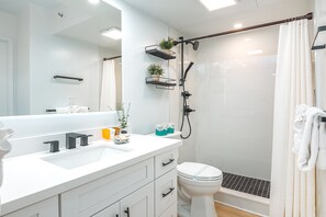 Freshen up in your full bathroom with a walk-in shower, and a vanity with a cabinet.