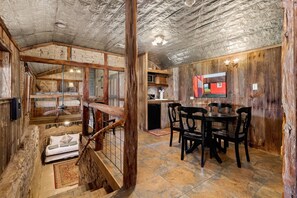 Picture a cozy setting where you and your companions can gather for a delightful meal or share moments of conversation.