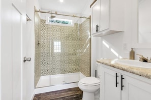 Clean and tidy bathroom with shower