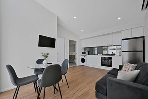 Living Area + Smart TV + Dining Area