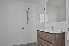 Bathroom - Shower + Toilet