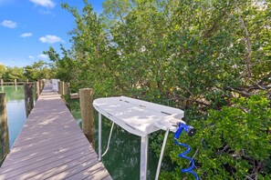 Prepare your bait at the fishing table.