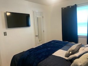 Queen Size Bed with Smart TV