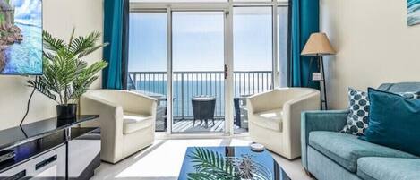 Sit & relax in this modern decorated living room directlyoverlooking the ocean!